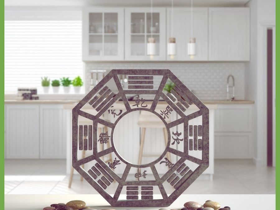 Bagua mirror standing in a white kitchen