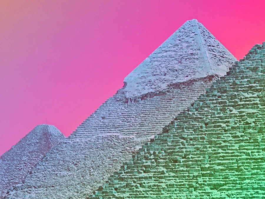 The Great Pyramid photographed from below in a pink-to-mint duotone