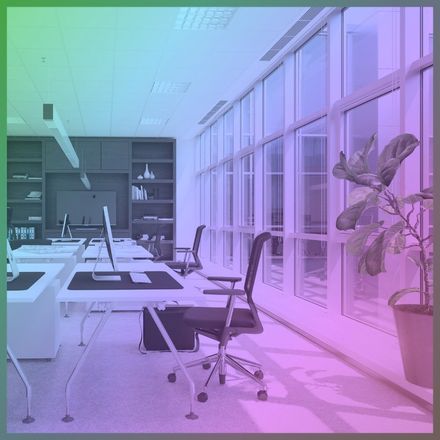 Open-plan office under an iridescent green and purple overlay